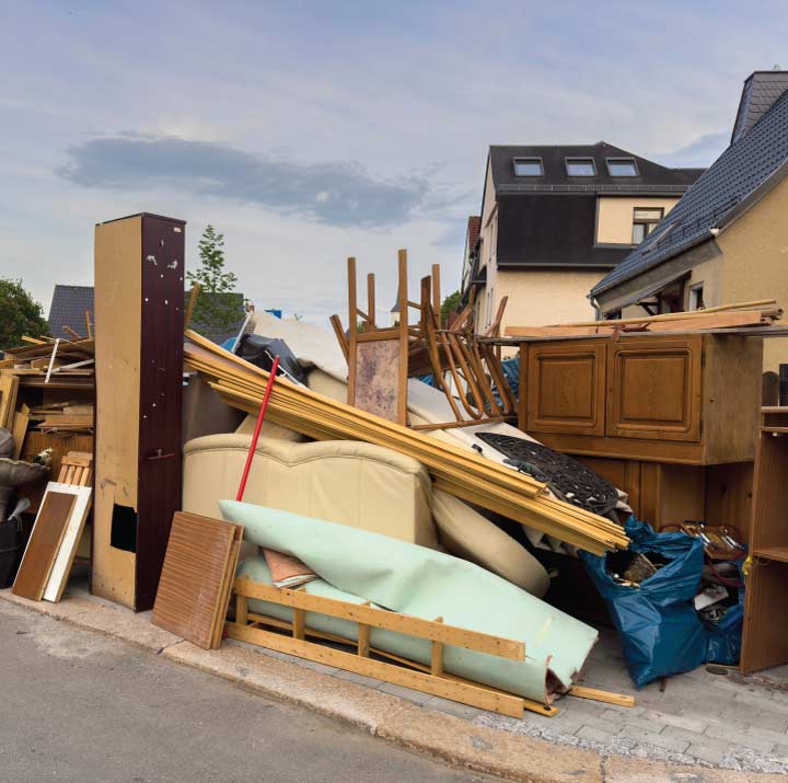  hauling away a bulky mattress and furniture from a rental property for a eviction cleanout